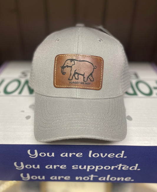 Hat with leather patch